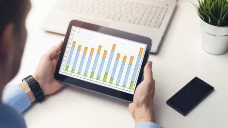 Man looking at stocks